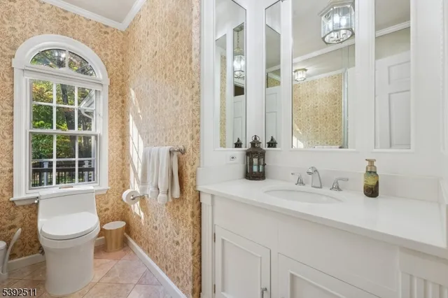 a view of an empty room with a fireplace