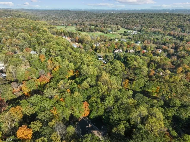a view of a patio with table and chairs and couches
