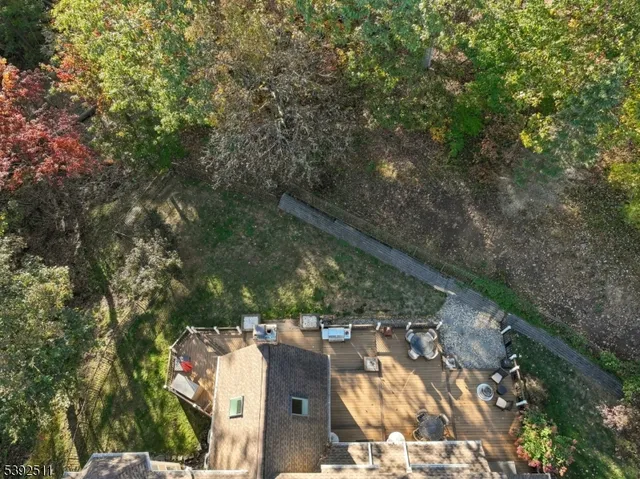 a picture of a bench in front of a gate