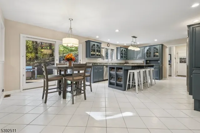 a view of a dining room kitchen counter top and dining room