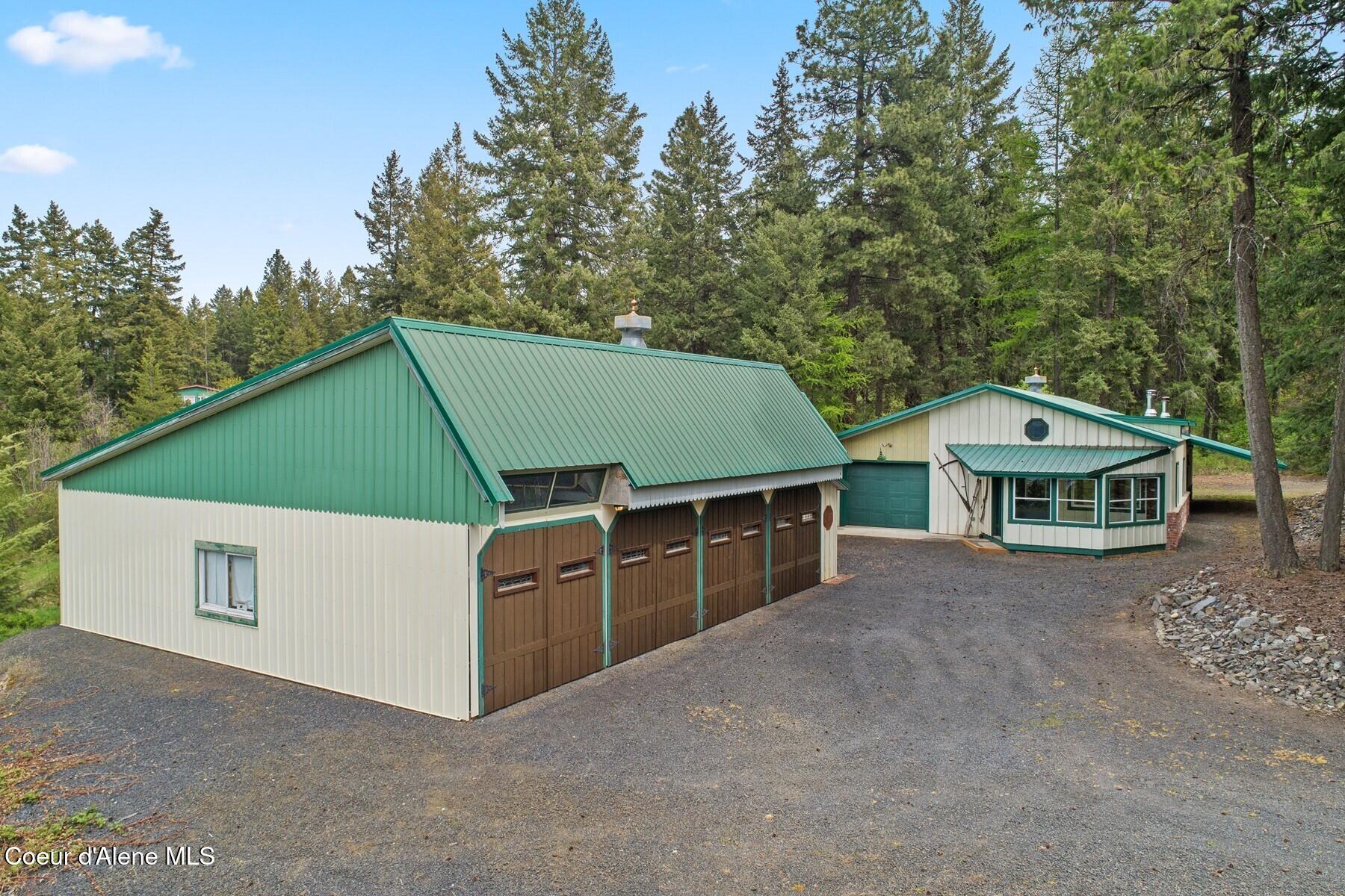 3467 East Sunset Drive Harrison, ID 83833 - Photo 45 of 54 30 x 60 Shop with 4 Doors