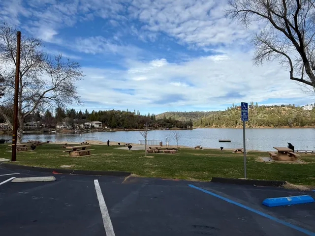 a view of a lake with a yard