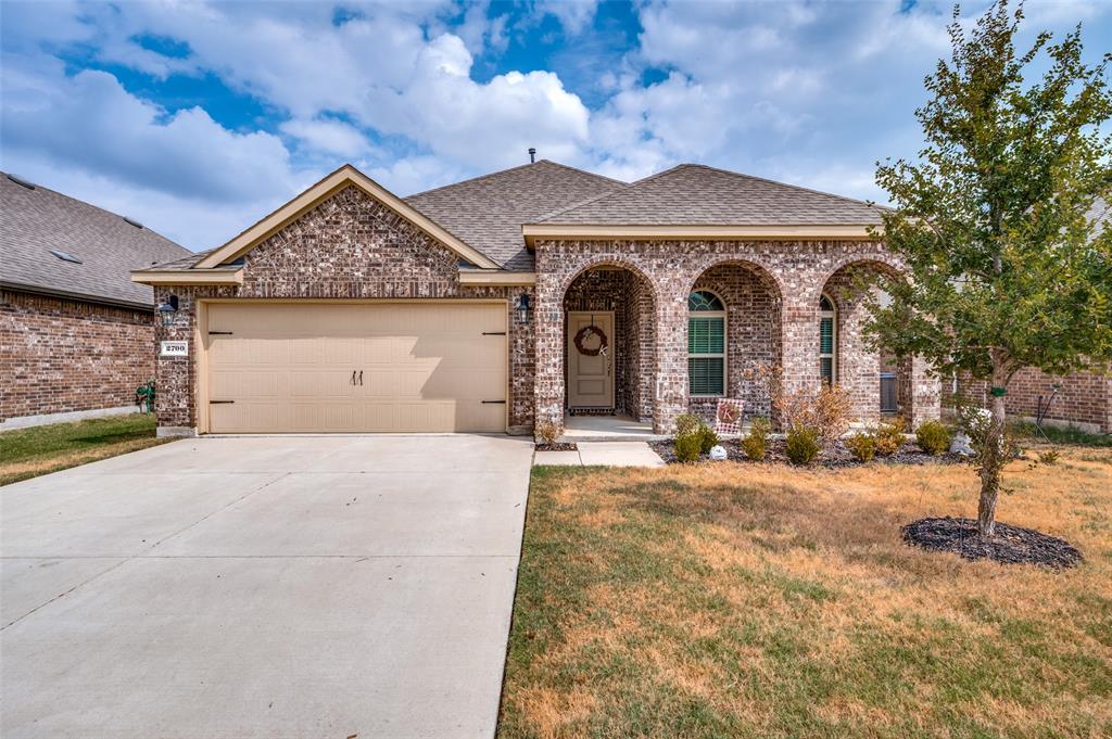 2700 Ainsworth Road Aubrey, TX 76227 - Photo 1 of 1 a front view of a house with garden
