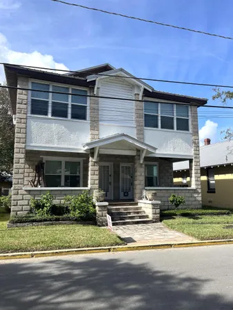 a view of a house with a swimming pool