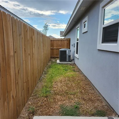 a view of a porch with wooden floor