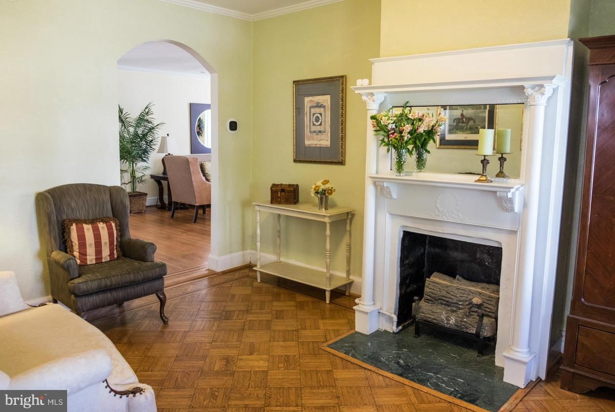 119 Hawthorn Road Baltimore, MD 21210 - Photo 2 of 30 a living room with furniture and a fireplace