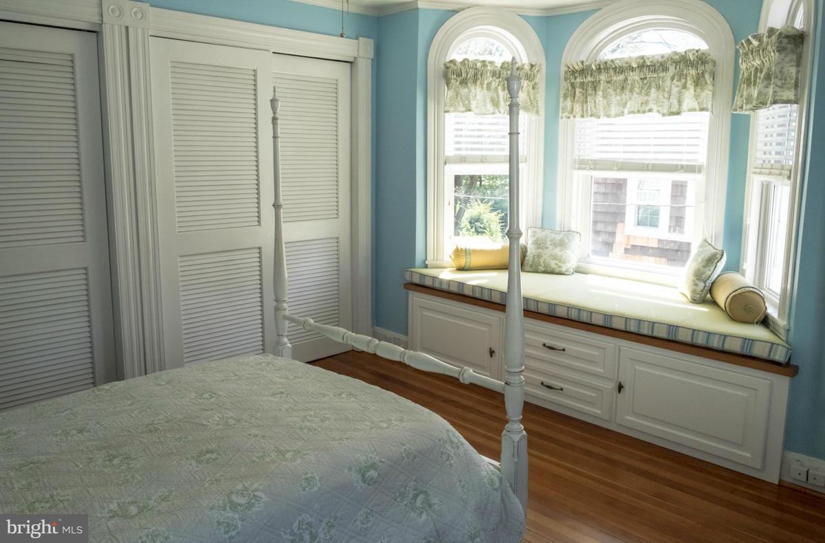 119 Hawthorn Road Baltimore, MD 21210 - Photo 18 of 30 a bedroom with a bed and a large window with the outer view