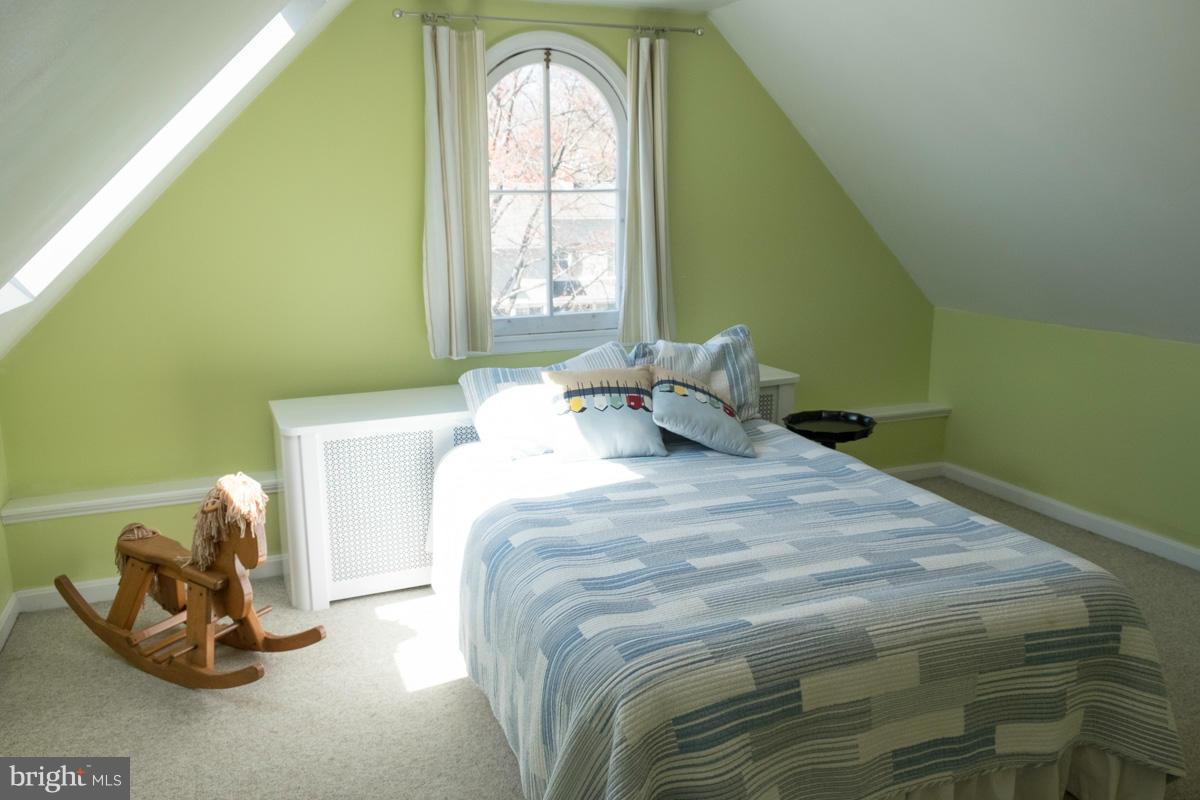 119 Hawthorn Road Baltimore, MD 21210 - Photo 24 of 30 a bedroom with a bed and a window