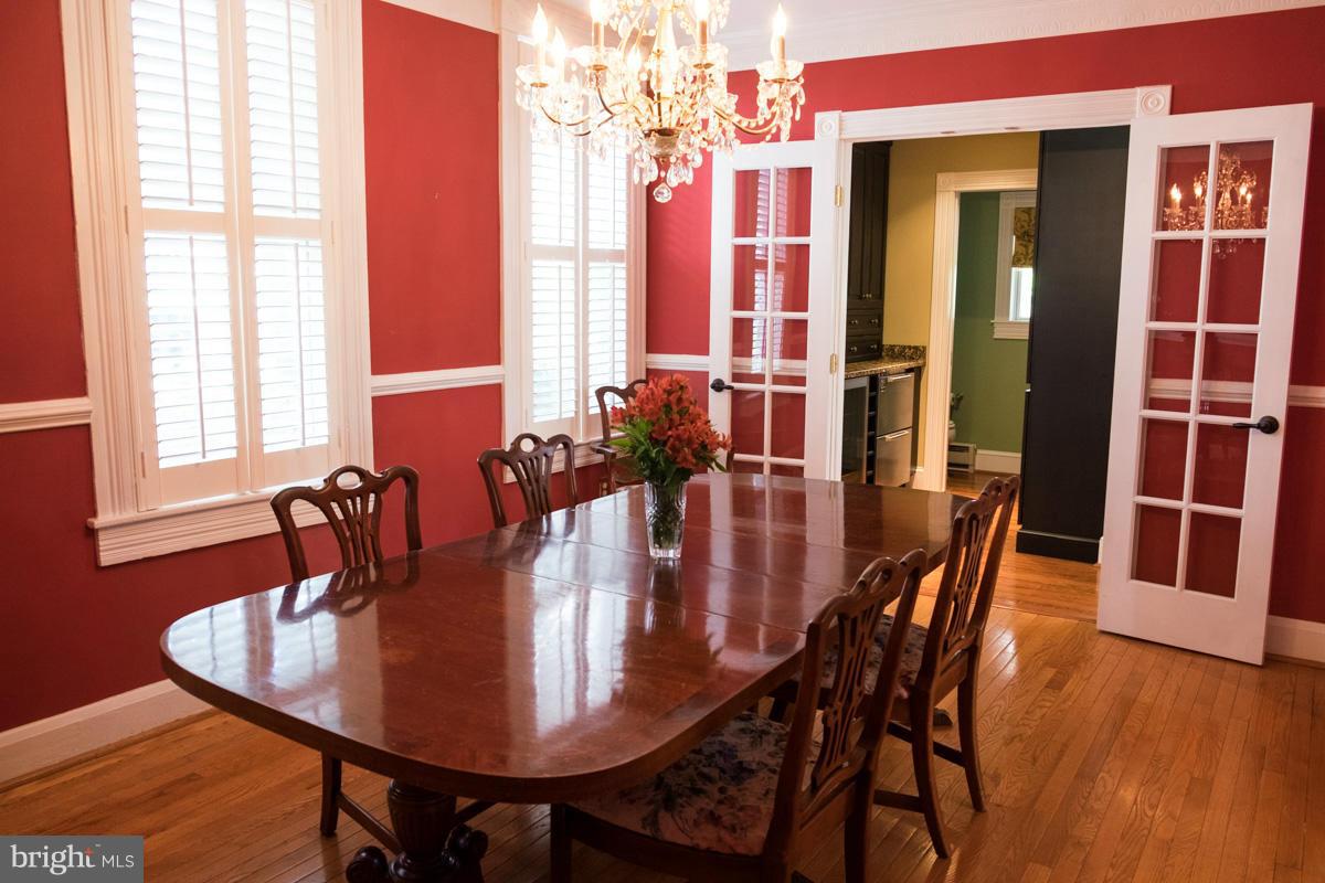 119 Hawthorn Road Baltimore, MD 21210 - Photo 10 of 30 a dining room with furniture window and wooden floor
