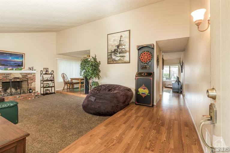 1888 Fitzgerald Road Simi Valley, CA 93065 - Photo 6 of 28 a living room with furniture and a fireplace