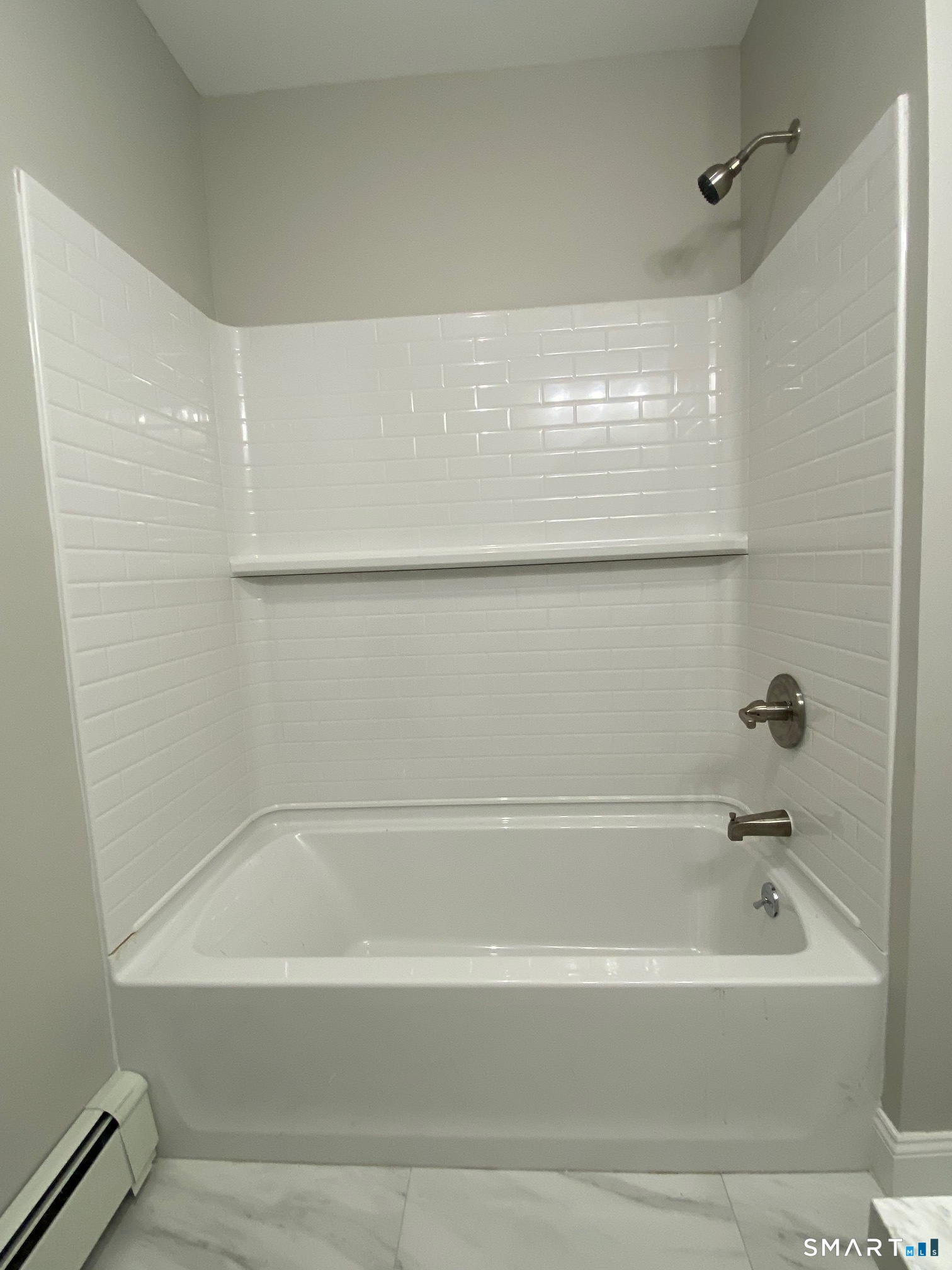 34 Center Street, Unit 2 Bristol, CT 06010 - Photo 13 of 13 a bathroom with a bathtub