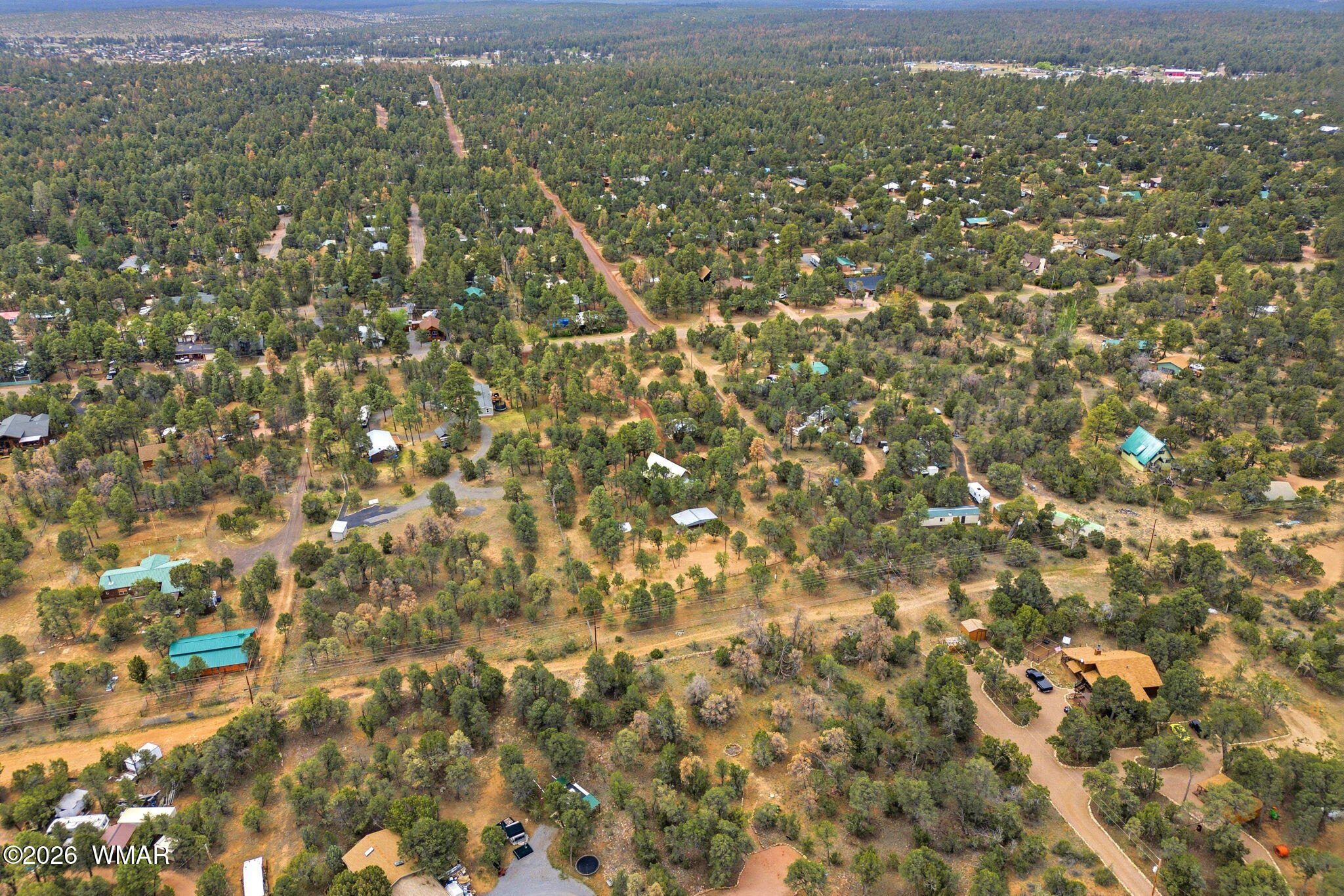 3072 Chevelon Road Overgaard, AZ 85933 - Photo 42 of 43 a view of a city with tall buildings
