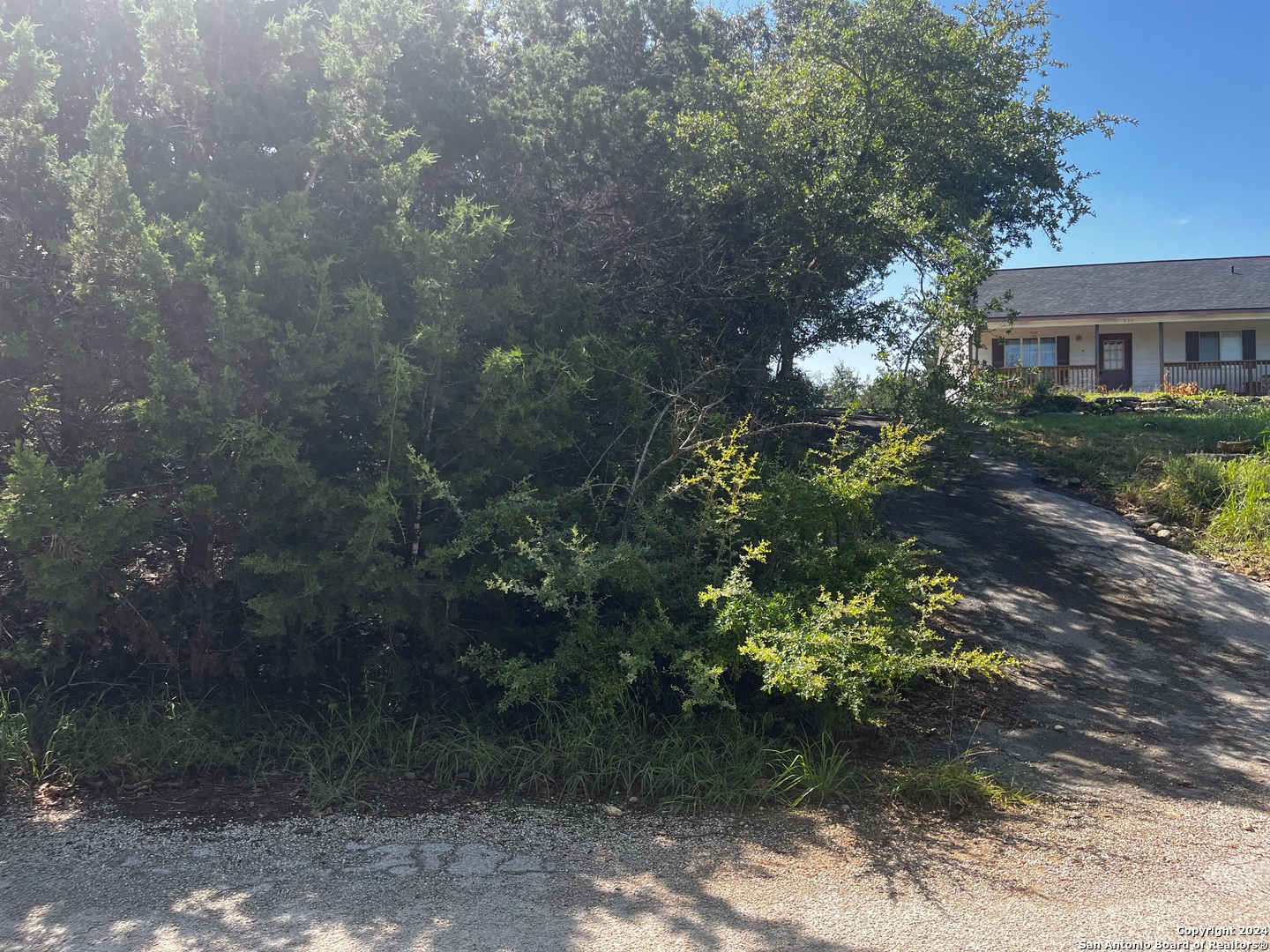628 Hillside Drive Spring Branch, TX 78070 - Photo 3 of 7 a view of a house with a yard