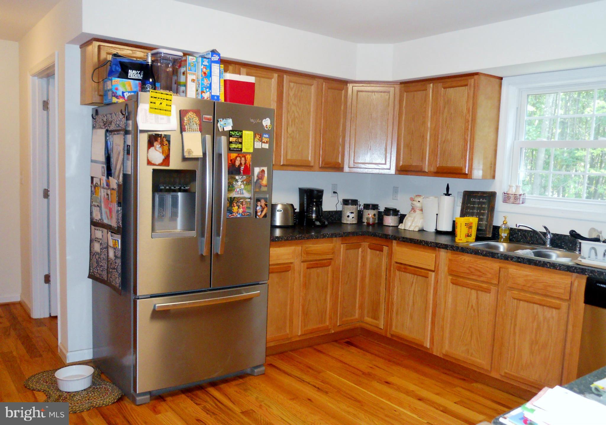 244 Fairview Church Road Gore, VA 22637 - Photo 11 of 30 a kitchen with stainless steel appliances granite countertop a refrigerator and a sink