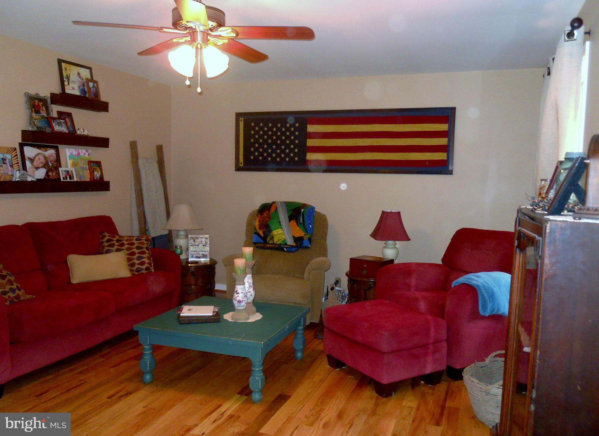 244 Fairview Church Road Gore, VA 22637 - Photo 17 of 30 a living room with furniture and a bookshelf