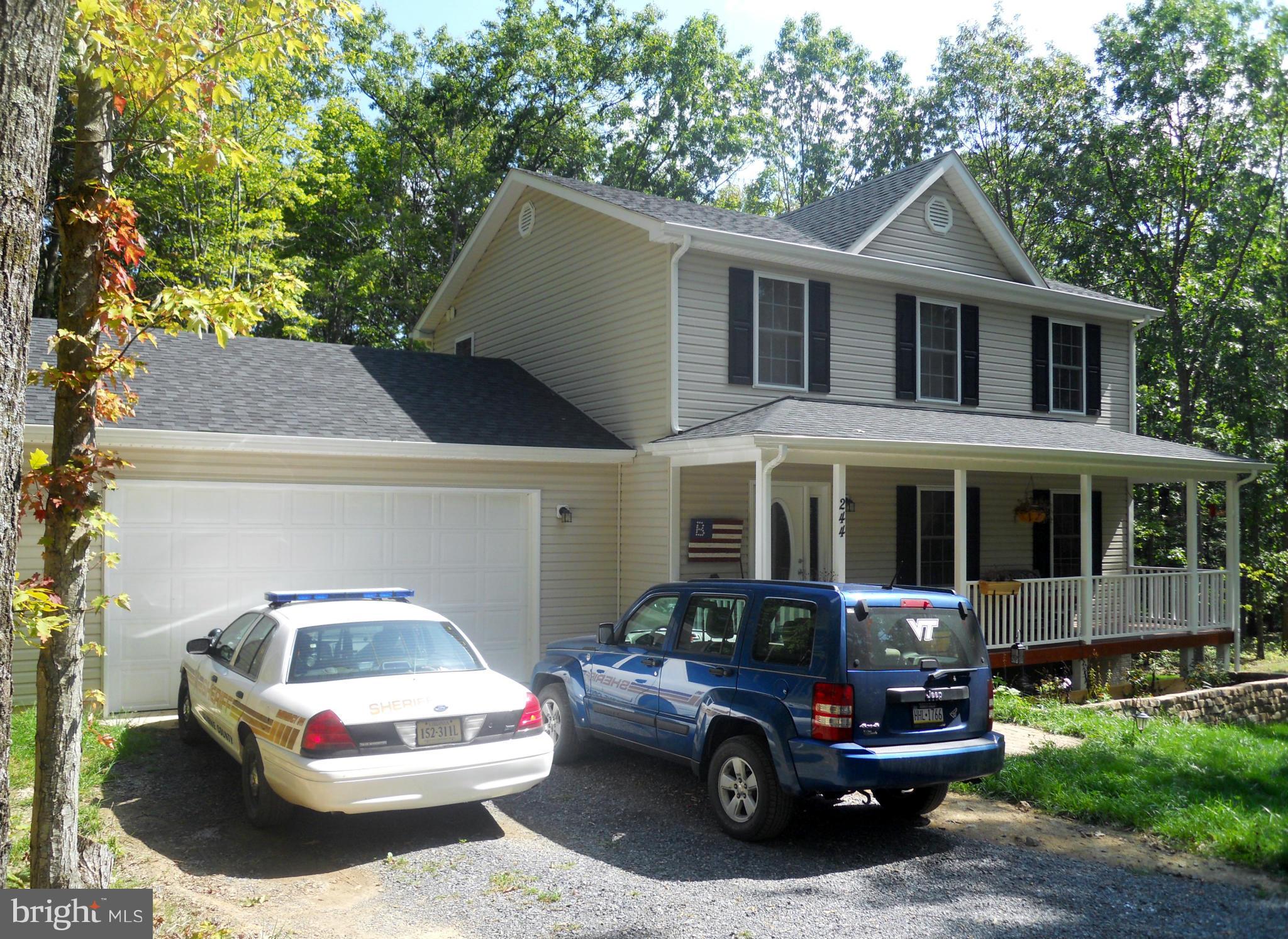 244 Fairview Church Road Gore, VA 22637 - Photo 3 of 30 a car parked in front of a house