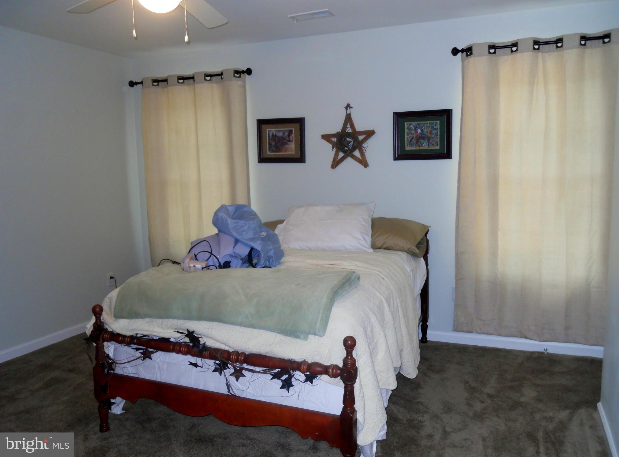 244 Fairview Church Road Gore, VA 22637 - Photo 21 of 30 a bedroom with a bed and a window