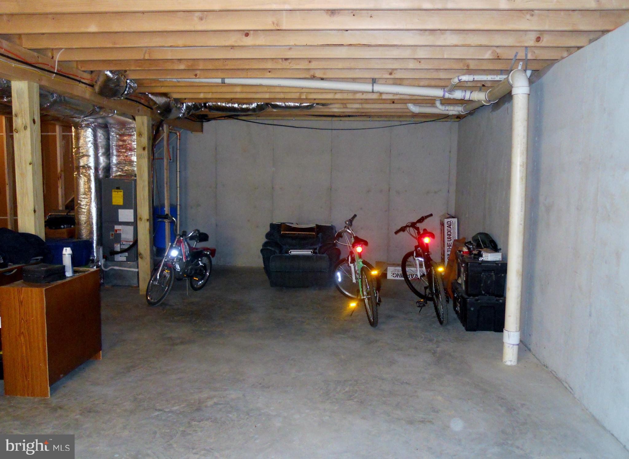244 Fairview Church Road Gore, VA 22637 - Photo 27 of 30 a view of a garage with a white car parked