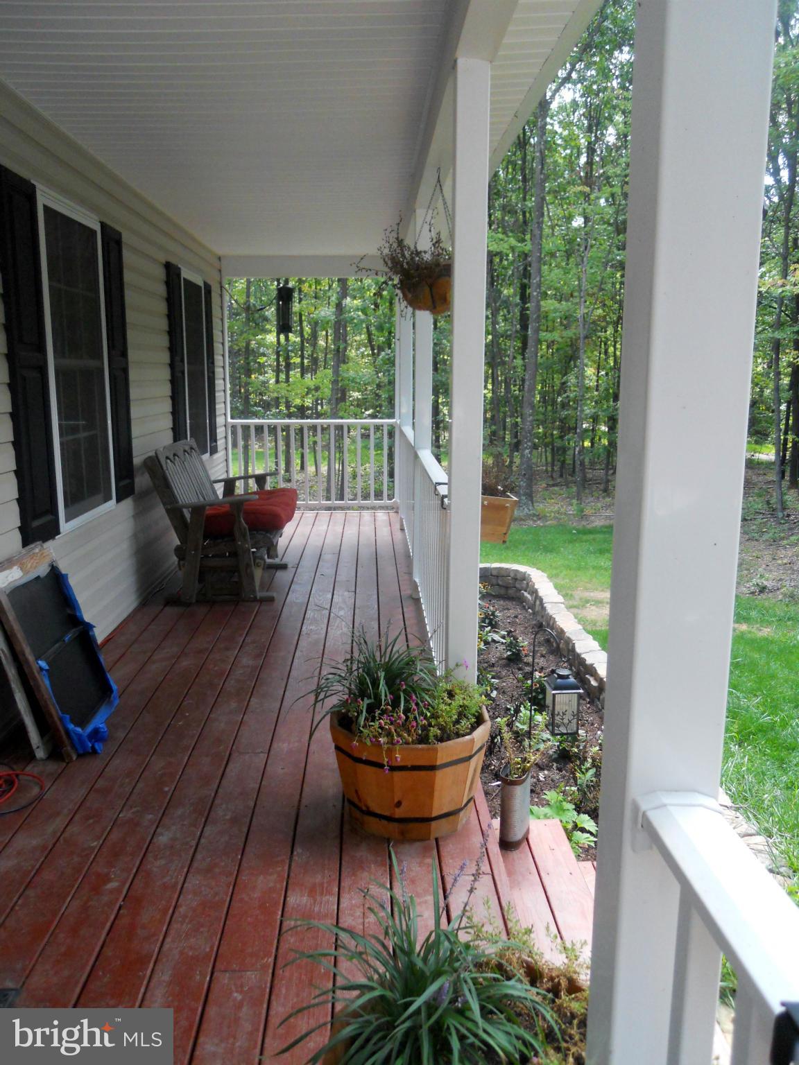244 Fairview Church Road Gore, VA 22637 - Photo 7 of 30 a view of a two chairs in the porch