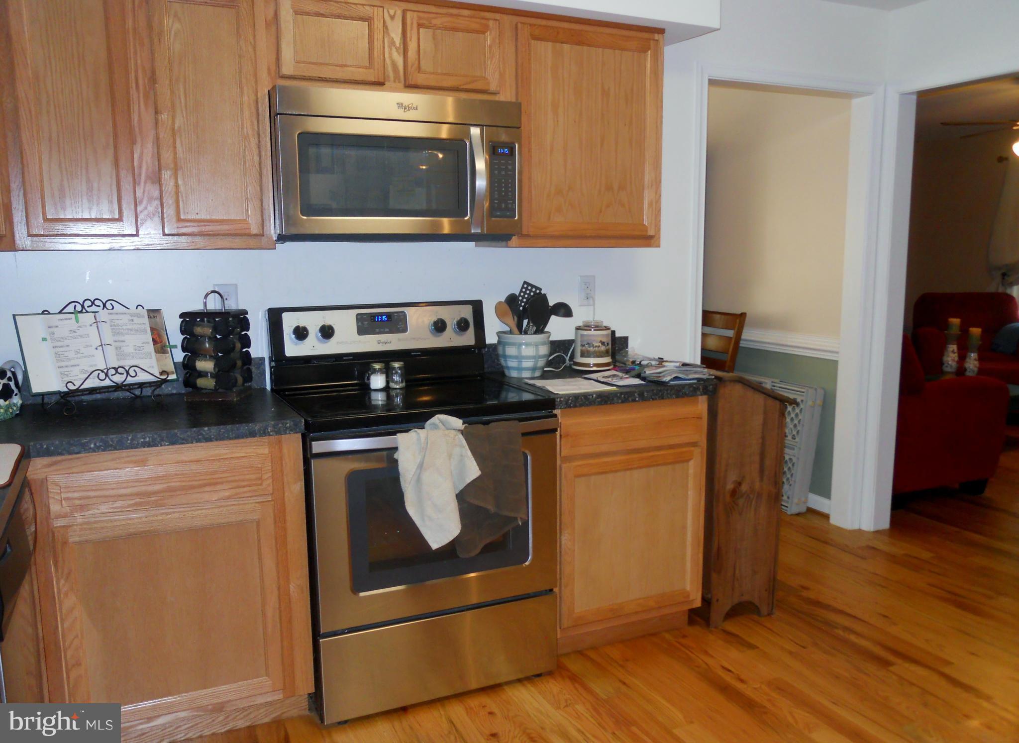 244 Fairview Church Road Gore, VA 22637 - Photo 10 of 30 a kitchen with a stove and a microwave