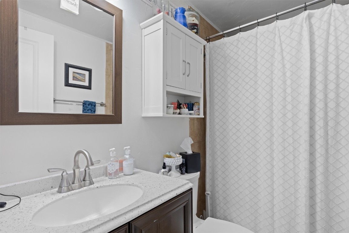 2646 Riverside Drive, Unit A Steamboat Springs, CO 80487 - Photo 5 of 12 a bathroom with a sink and a mirror