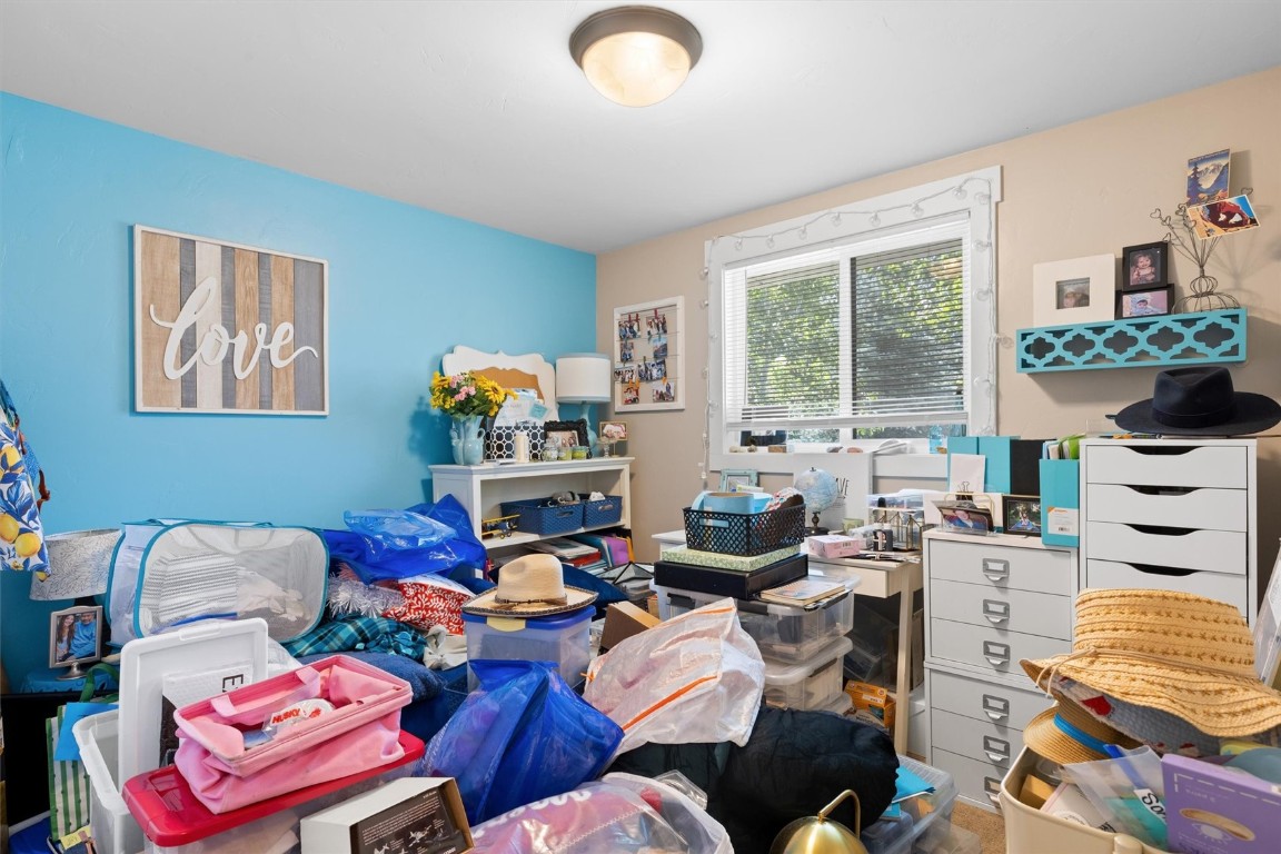 2646 Riverside Drive, Unit A Steamboat Springs, CO 80487 - Photo 6 of 12 a living room with furniture a window and a flat screen tv