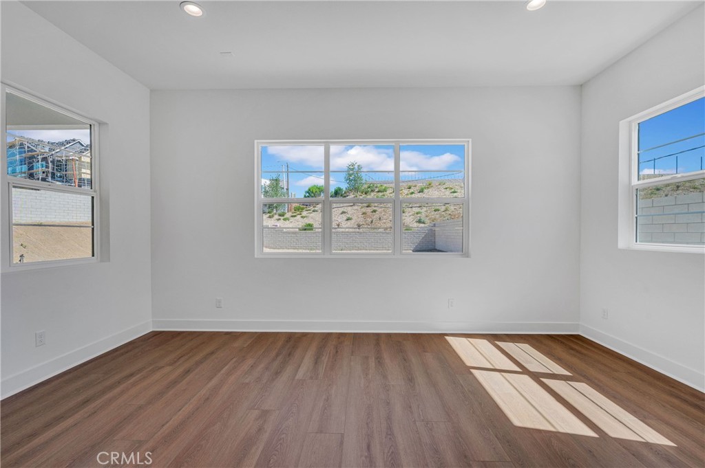 27510 Elderberry Drive Valencia, CA 91381 - Photo 21 of 60 a view of wooden floor in a room