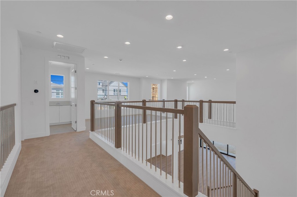 27510 Elderberry Drive Valencia, CA 91381 - Photo 28 of 60 a view of a hallway with workspace