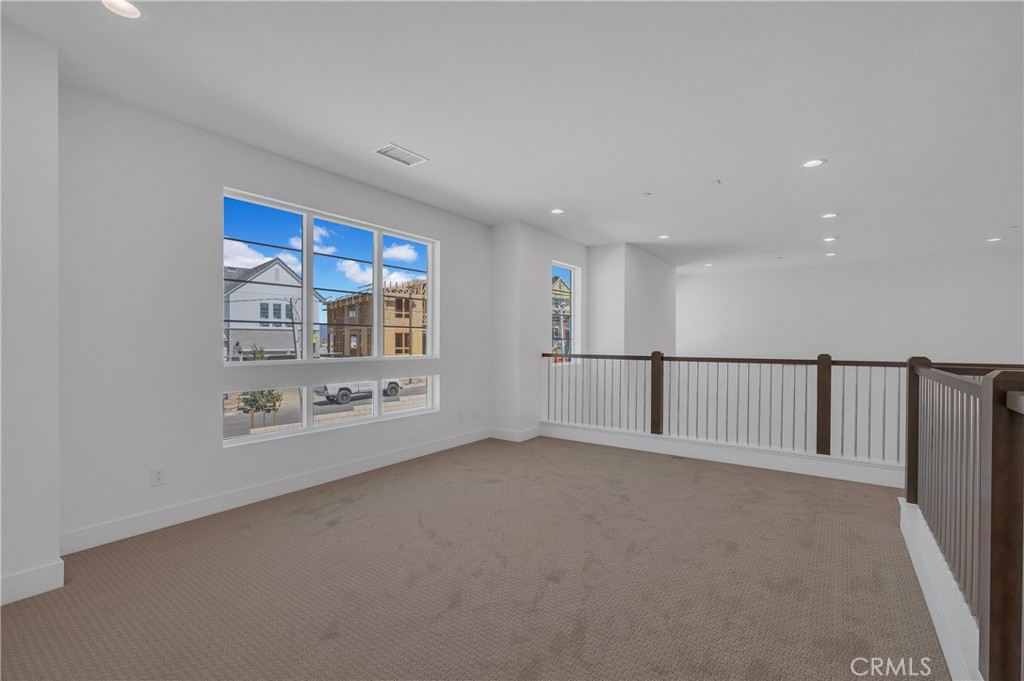 27510 Elderberry Drive Valencia, CA 91381 - Photo 29 of 60 a view of an empty room with a window