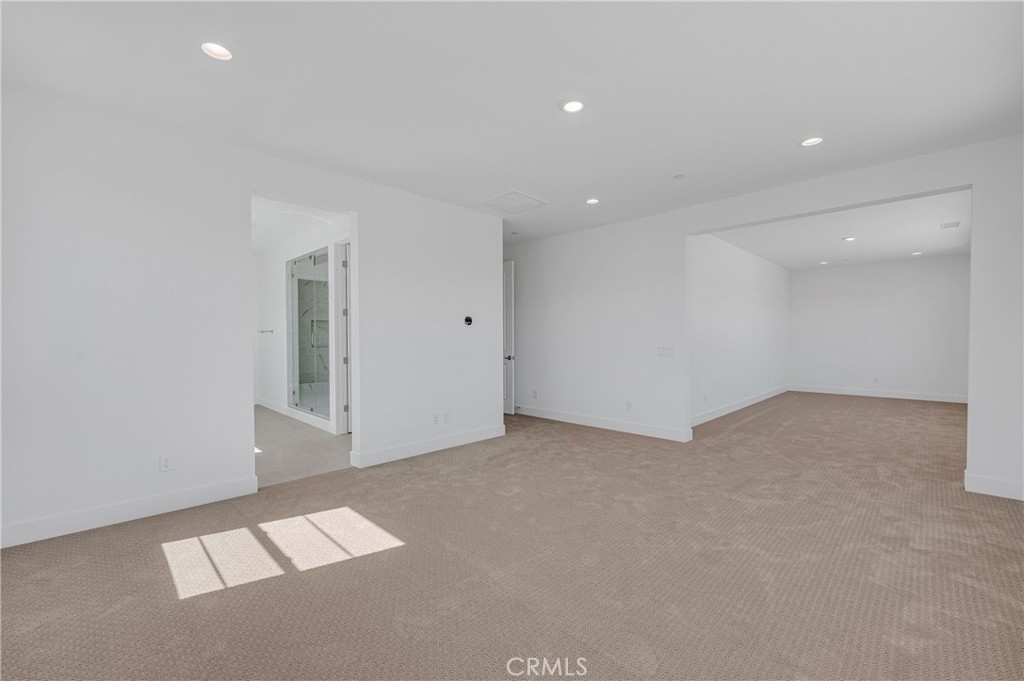 27510 Elderberry Drive Valencia, CA 91381 - Photo 33 of 60 an empty room with windows