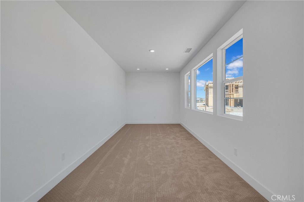 27510 Elderberry Drive Valencia, CA 91381 - Photo 34 of 60 a view of an empty room with a window