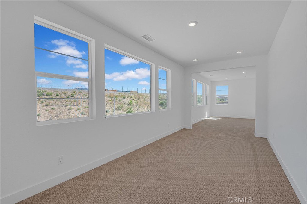 27510 Elderberry Drive Valencia, CA 91381 - Photo 35 of 60 a view of an empty room and a window