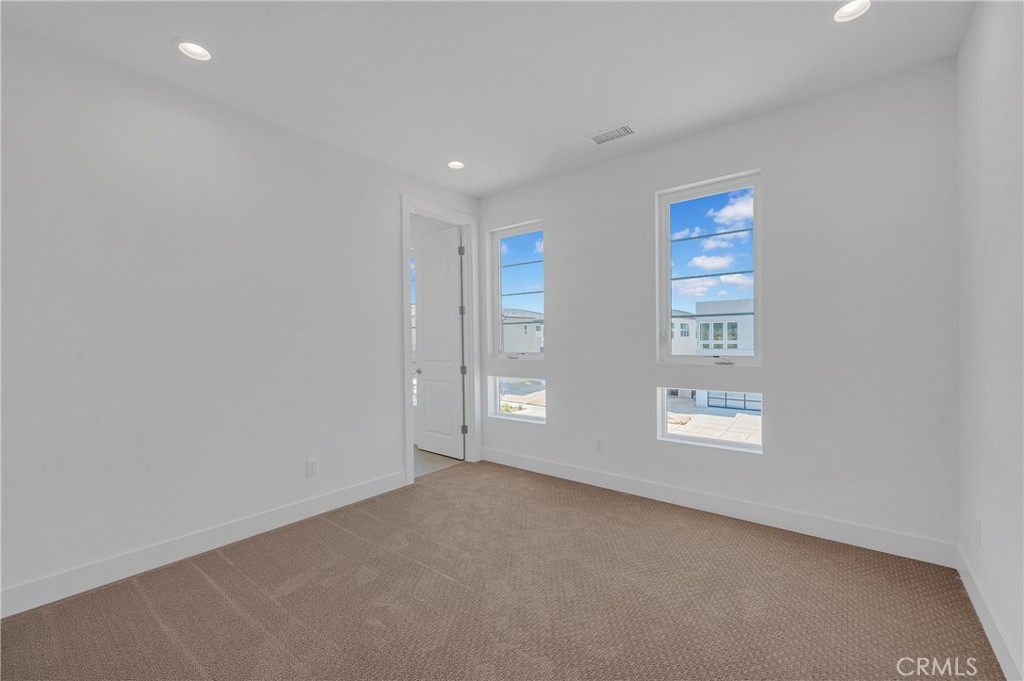 27510 Elderberry Drive Valencia, CA 91381 - Photo 42 of 60 an empty room with windows