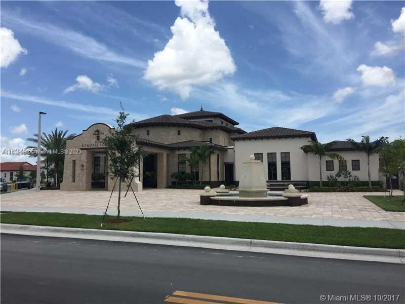 The Hammocks Miami, FL 33196 - Photo 1 of 34 a front view of a house with a garden