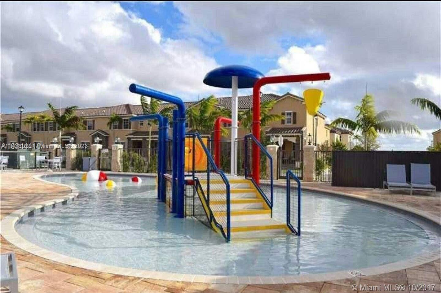 The Hammocks Miami, FL 33196 - Photo 20 of 34 a view of a swimming pool with a patio