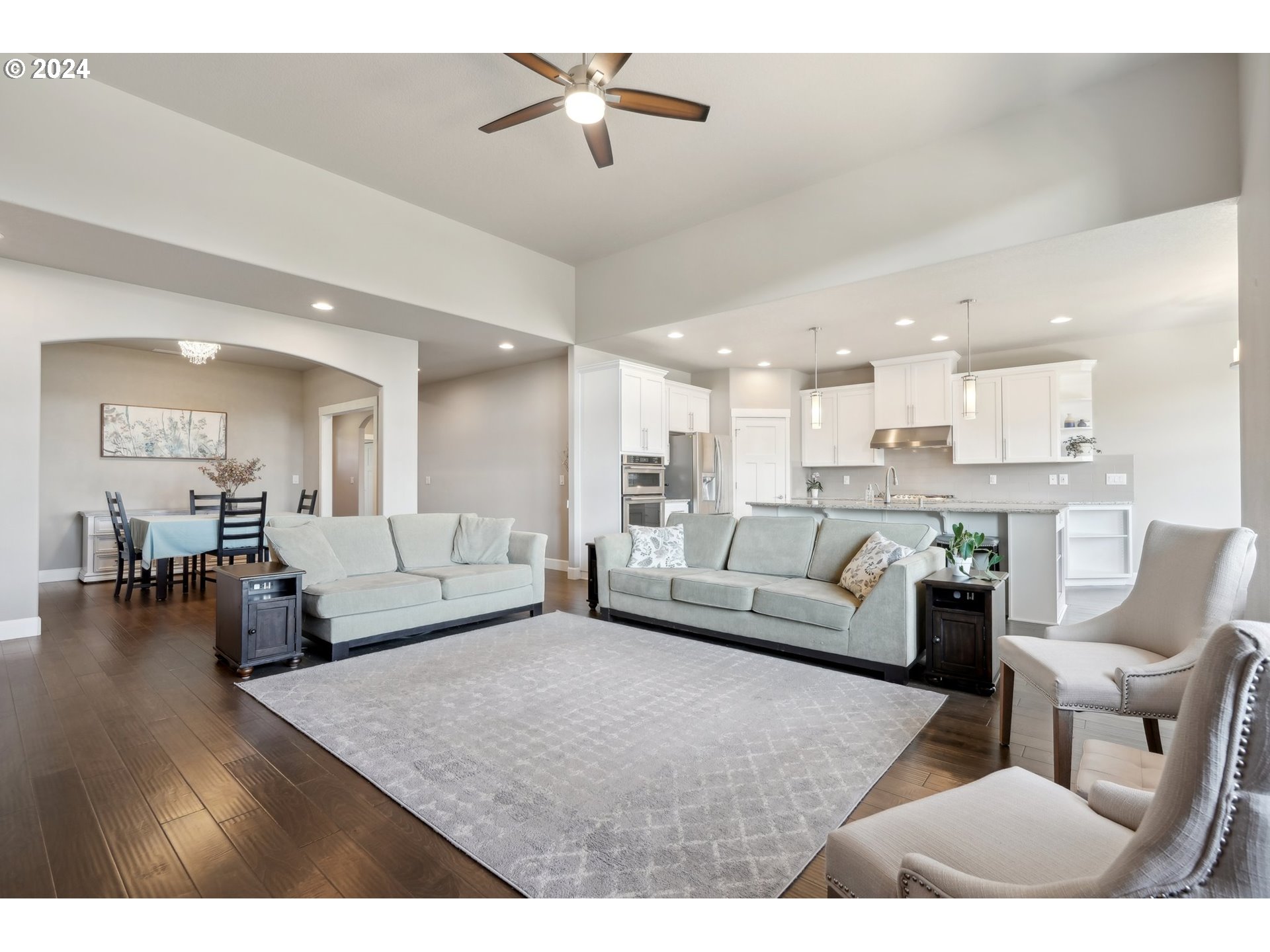 1701 South Nighthawk Road Ridgefield, WA 98642 - Photo 12 of 45 a living room with furniture and kitchen view