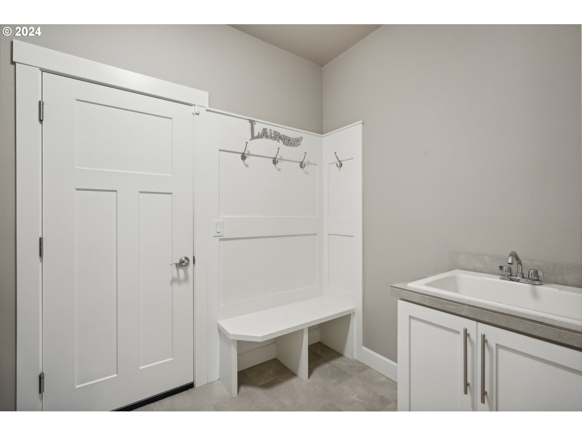 1701 South Nighthawk Road Ridgefield, WA 98642 - Photo 22 of 45 a bathroom with a sink vanity and a mirror