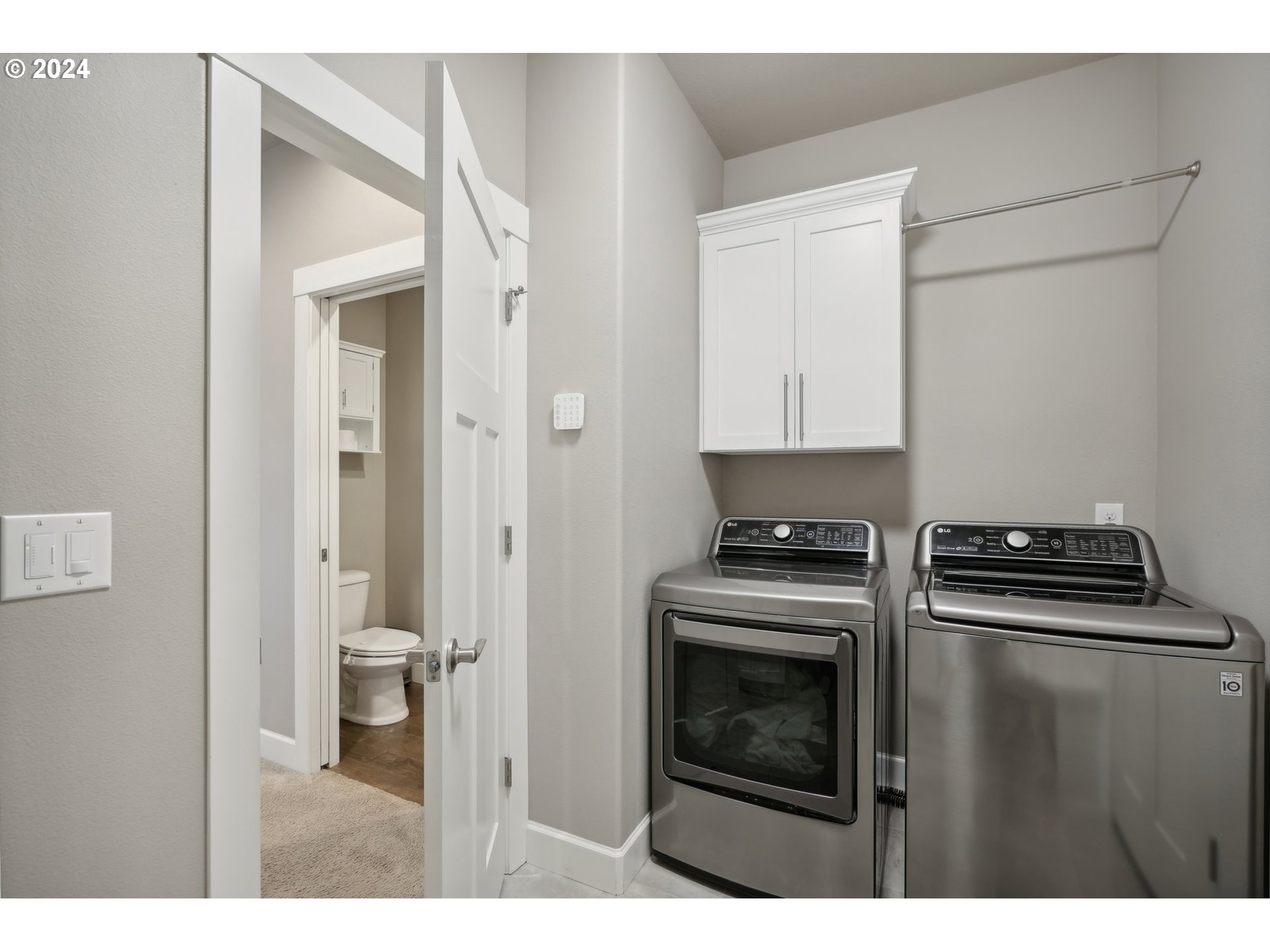1701 South Nighthawk Road Ridgefield, WA 98642 - Photo 23 of 45 a kitchen with a stove and a microwave