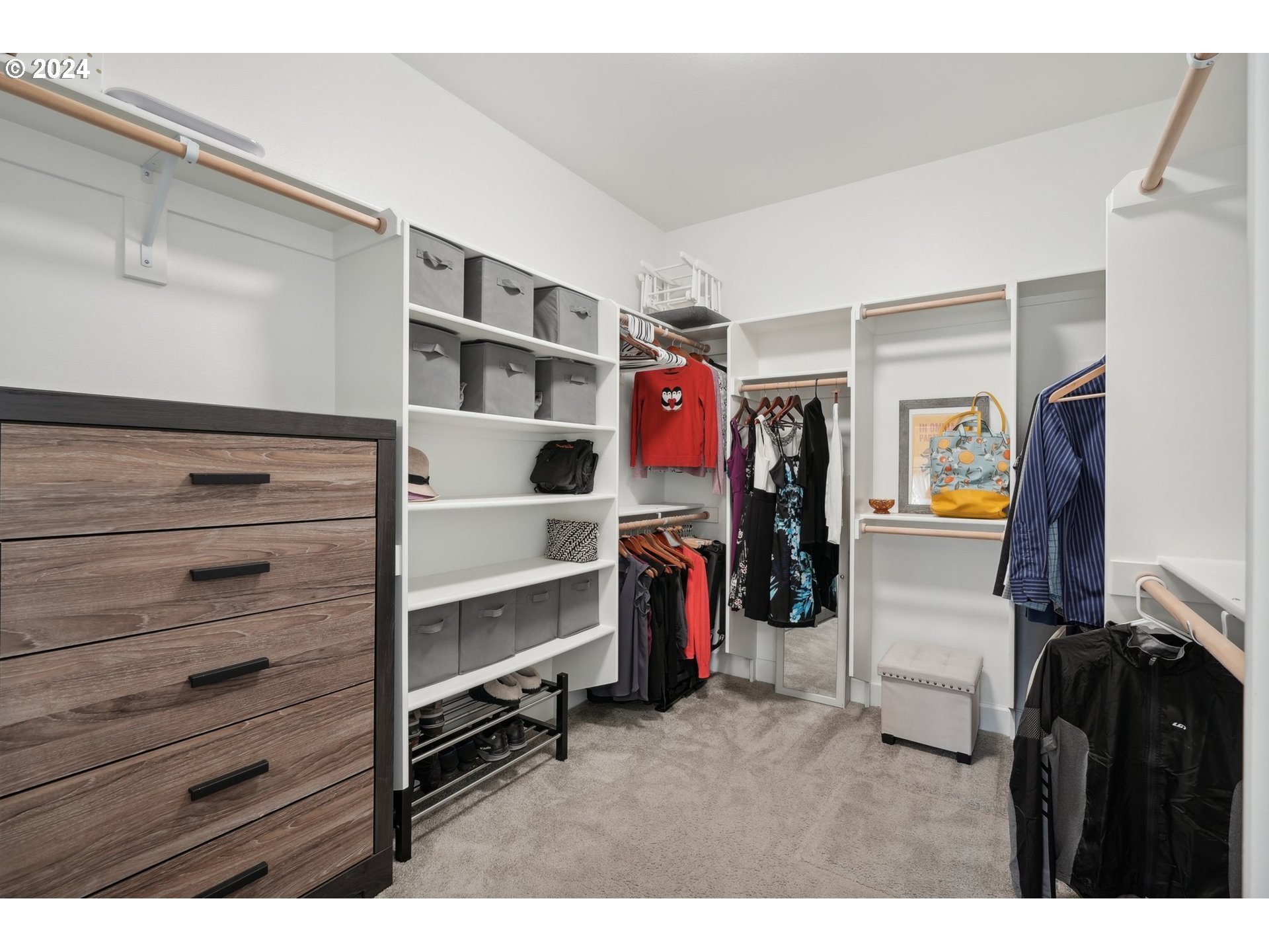1701 South Nighthawk Road Ridgefield, WA 98642 - Photo 27 of 45 a view of walk in closet with clothes and shoes