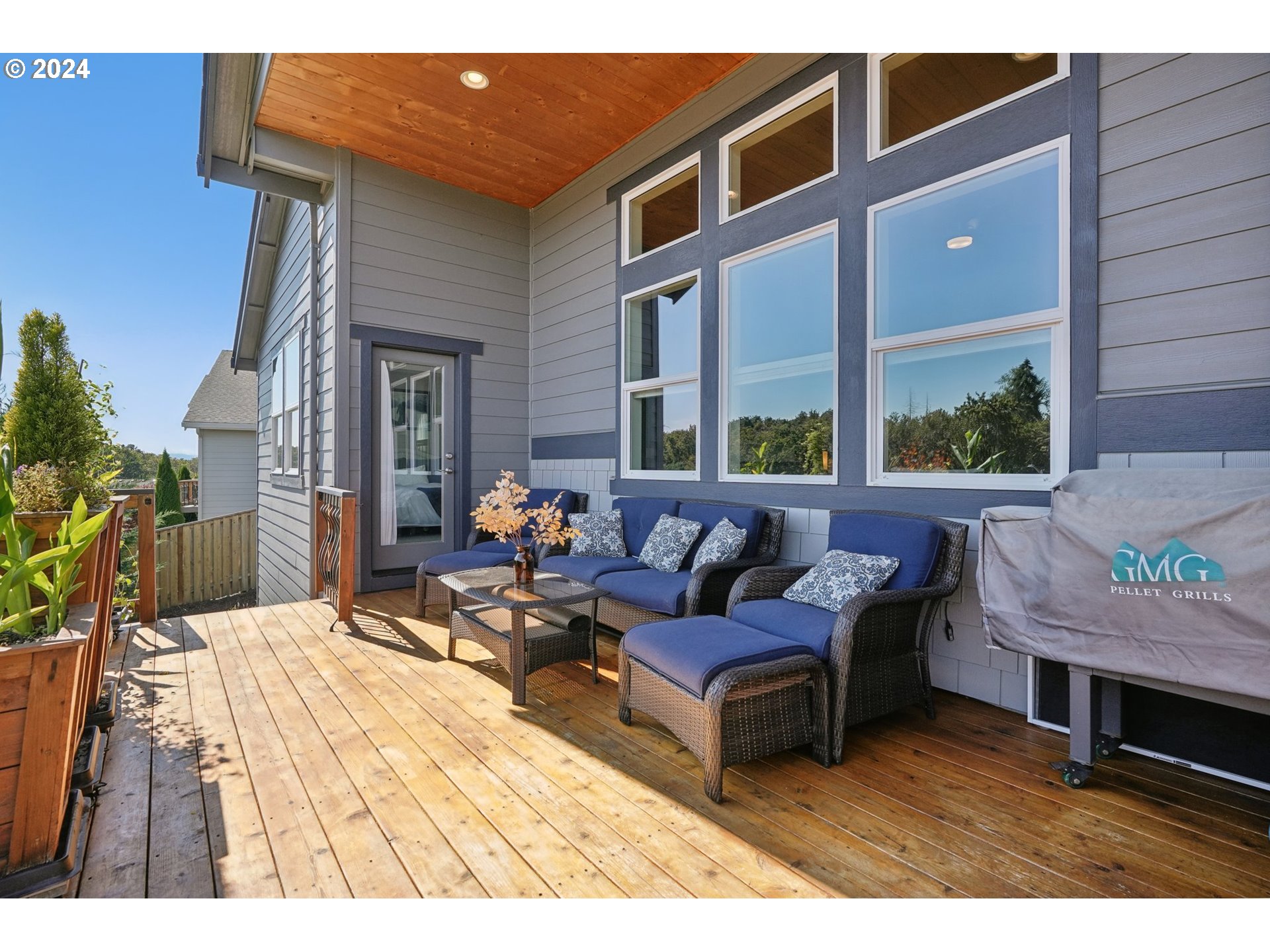 1701 South Nighthawk Road Ridgefield, WA 98642 - Photo 35 of 45 a outdoor living space with furniture and a potted plant