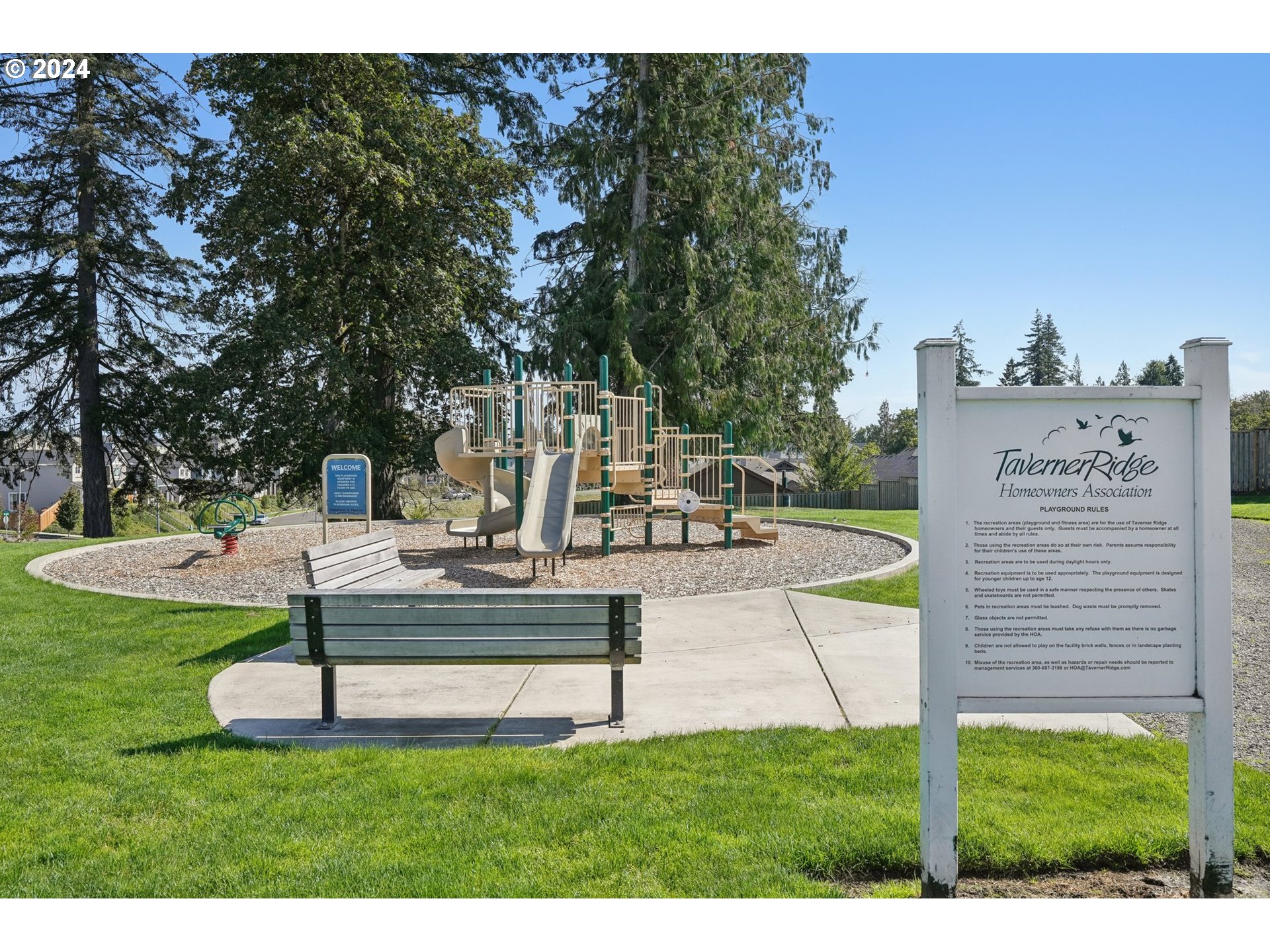 1701 South Nighthawk Road Ridgefield, WA 98642 - Photo 41 of 45 a view of a park with swings