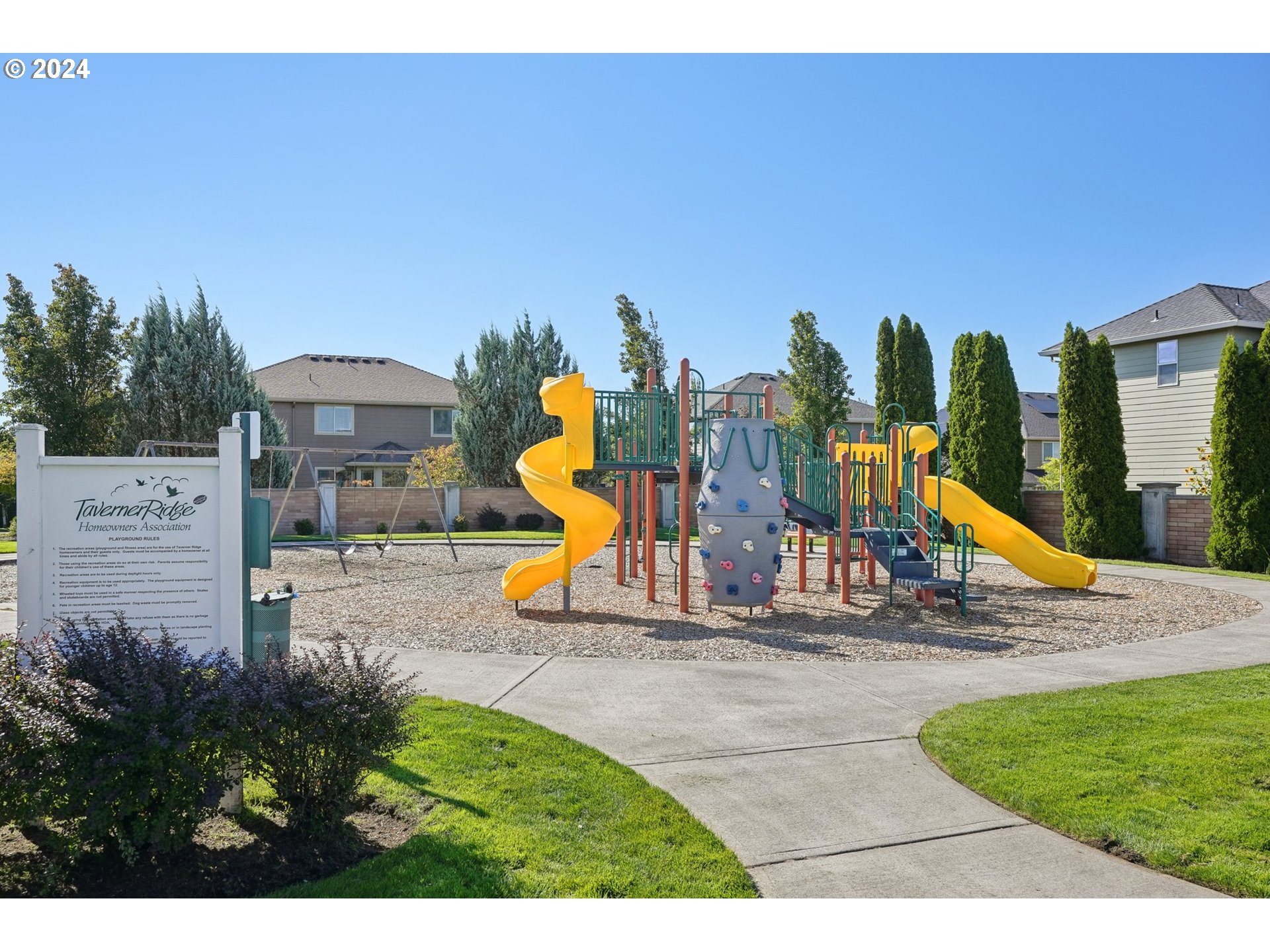1701 South Nighthawk Road Ridgefield, WA 98642 - Photo 44 of 45 a view of a park with swings and slides