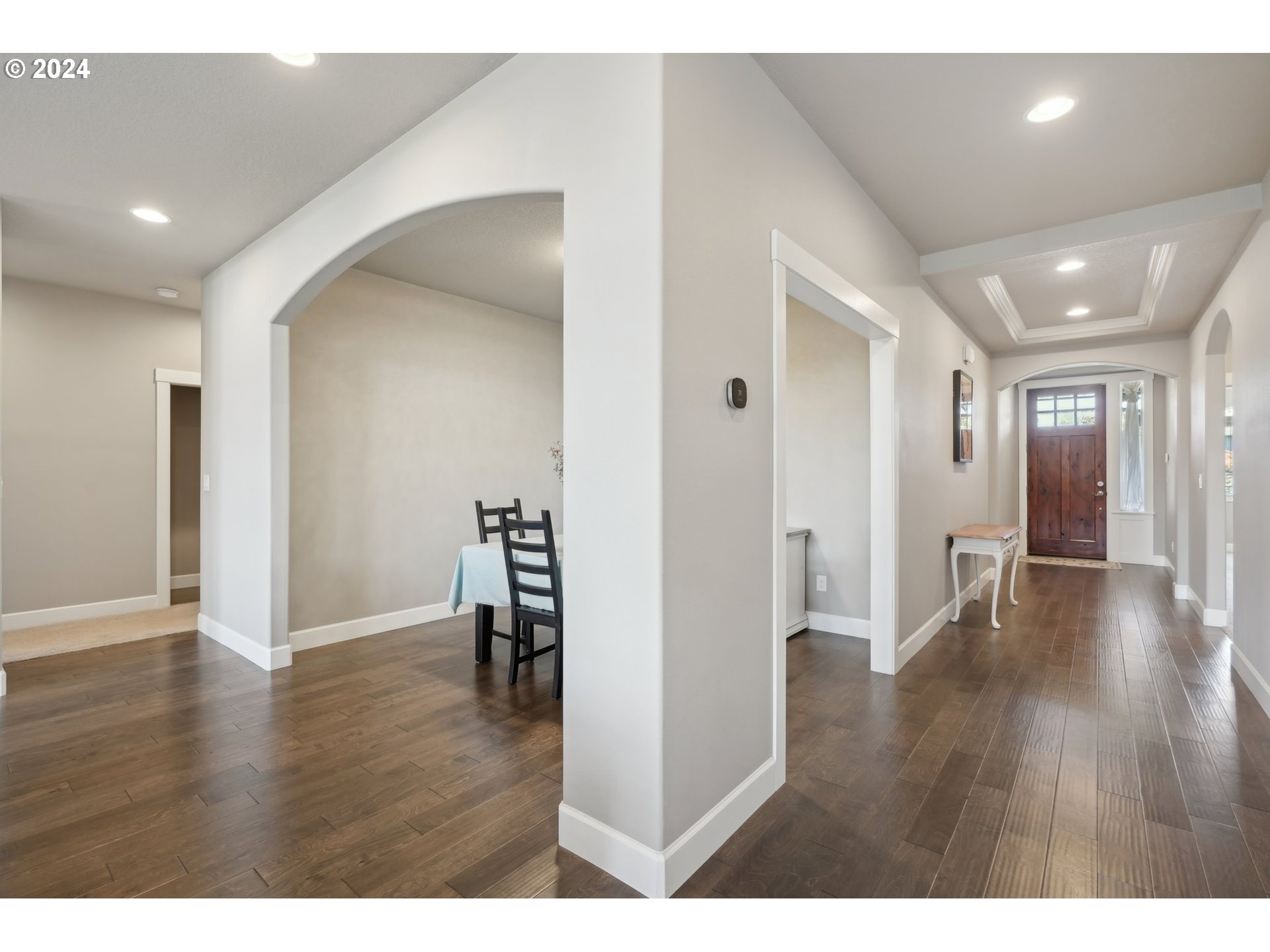 1701 South Nighthawk Road Ridgefield, WA 98642 - Photo 4 of 45 a view of a hallway with wooden floor