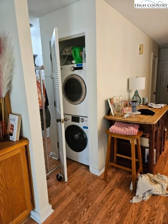 116 Grand Boulevard, Unit 1M Boone, NC 28607 - Photo 7 of 14 a living room with furniture and a wooden floor