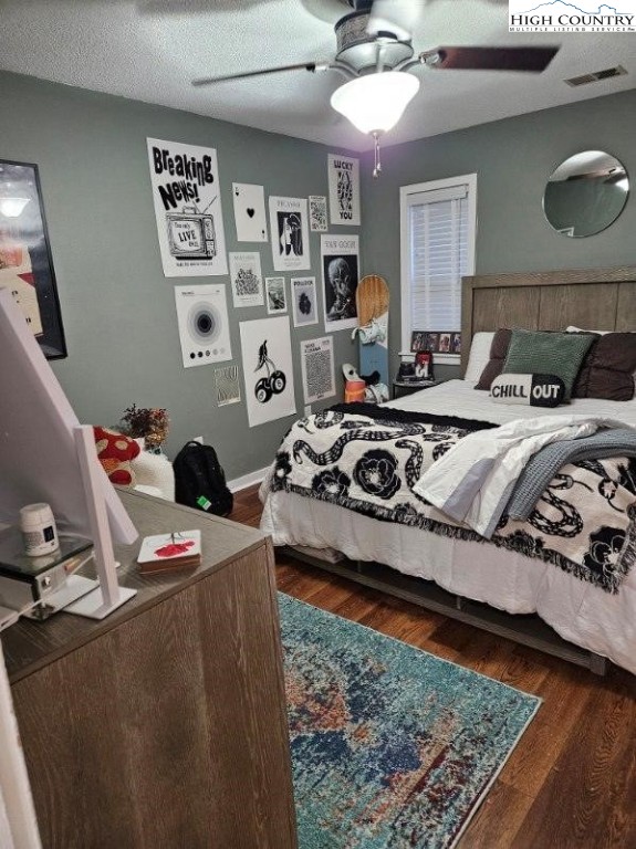 116 Grand Boulevard, Unit 1M Boone, NC 28607 - Photo 9 of 14 a bed room with two bed and a chair