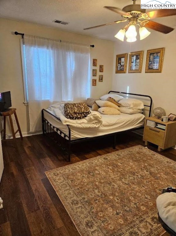 116 Grand Boulevard, Unit 1M Boone, NC 28607 - Photo 10 of 14 a living room with hard wood flooring and furniture