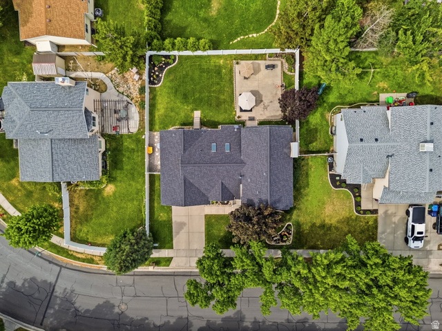 1101 Old Dairy Road Sandy, UT 84094 - Photo 4 of 36 Expansive property with a dark shingle roof and skylights
