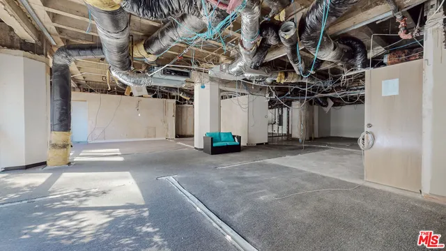 a view of a garage with wooden wall