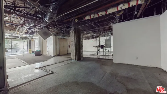 a view of a room with wooden walls