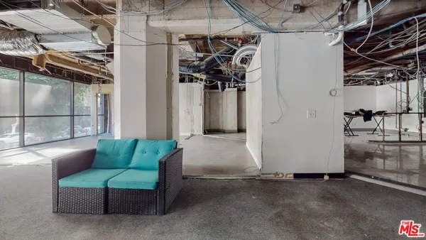 a view of a room with wooden walls